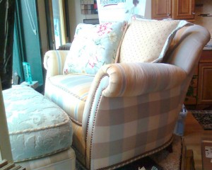 Upholstered chair and ottoman